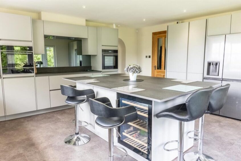 Large modern kitchen and dining area in the Kinross-shire home.
