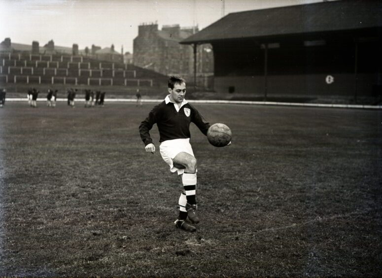 Billy Steel does keepie uppies at Dens in 1950