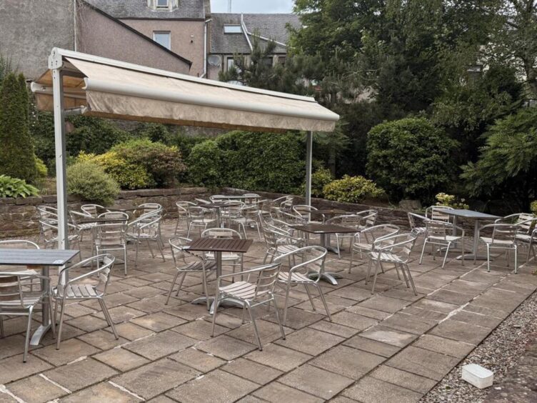 The paved beer garden at the Blairgowrie pub for sale 