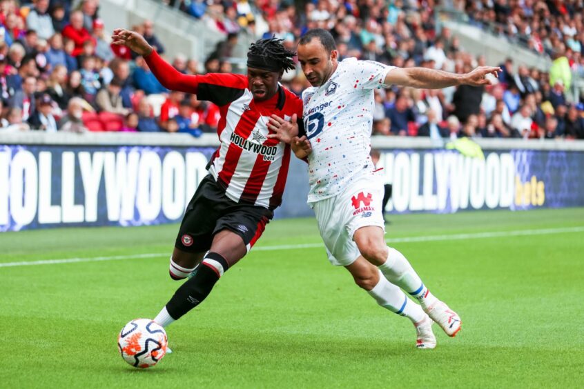 Tony Yogane in action for Brentford in a friendly against Lille last summer. Image: PA