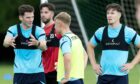 Jack Baird issues an instruction on the training pitch.