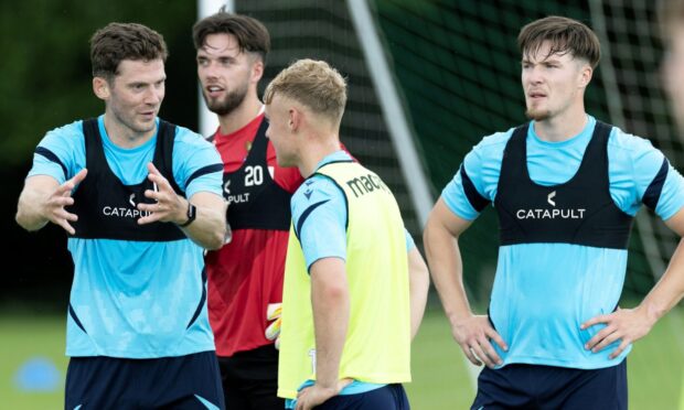 Jack Baird issues an instruction on the training pitch.