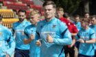 Morgan Boyes leads a pre-season run.
