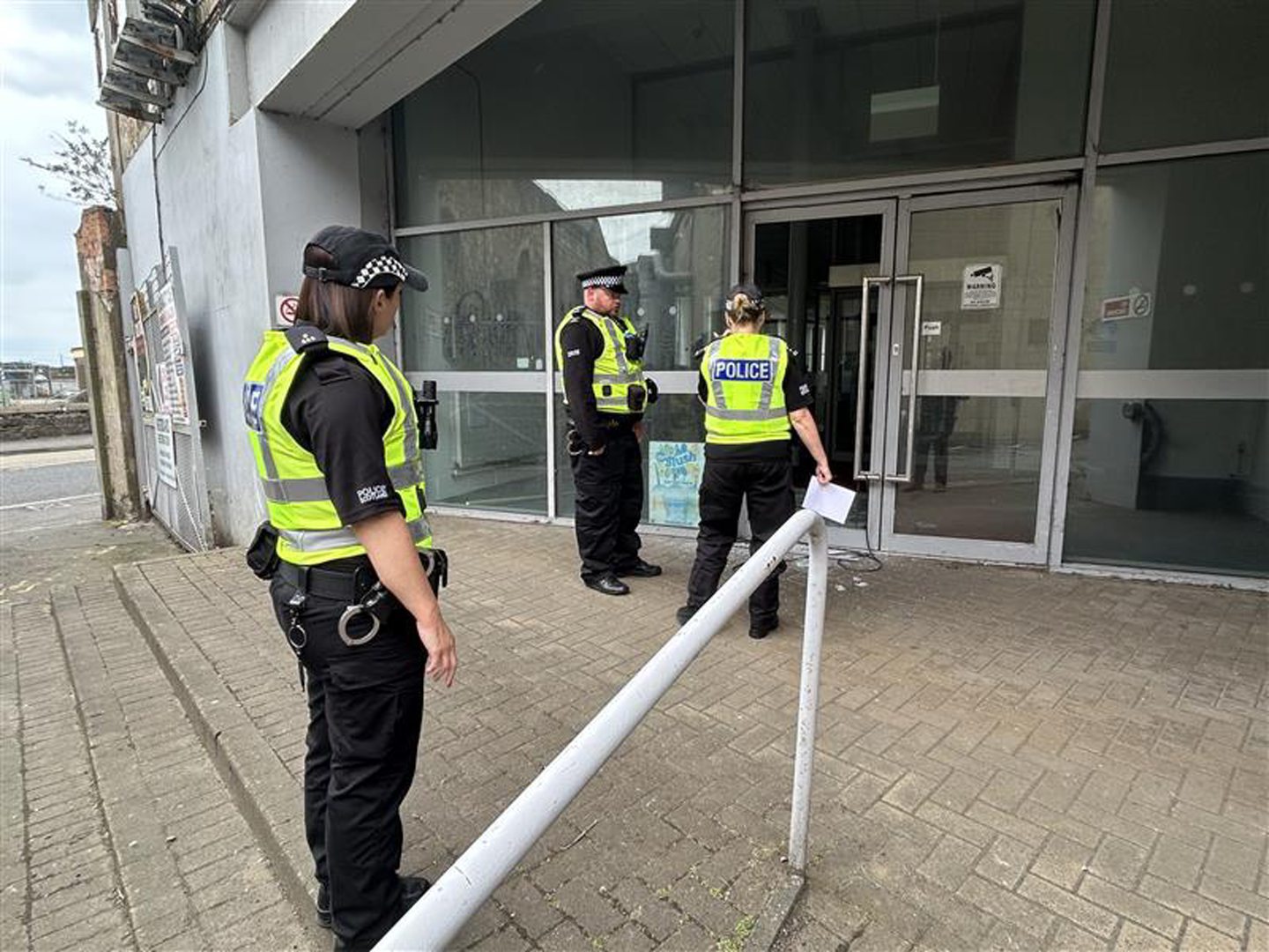 Police at the Mill following the raid.