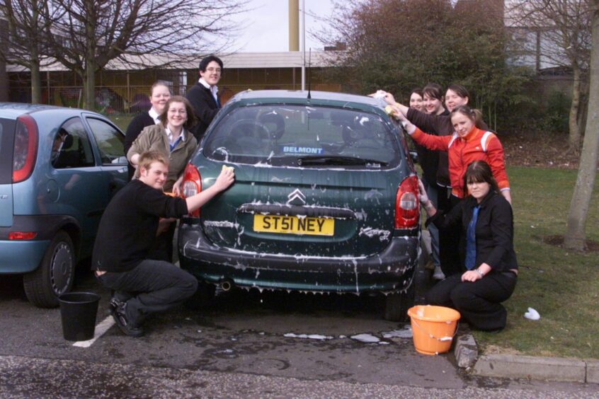 Pupils hard at work at a sponsored car wash in March 2005.