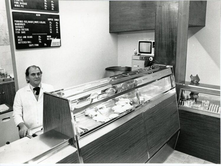 Romano Biondi in his chip shop.
