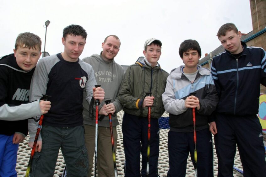 Pupils at the dry ski slope with support worker Liam McKenzie