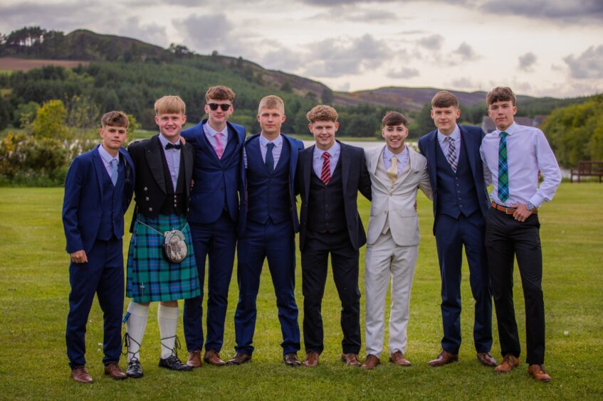 Boys posing for a picture.