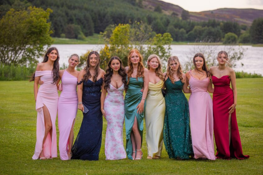 Glamorous girls posing together.
