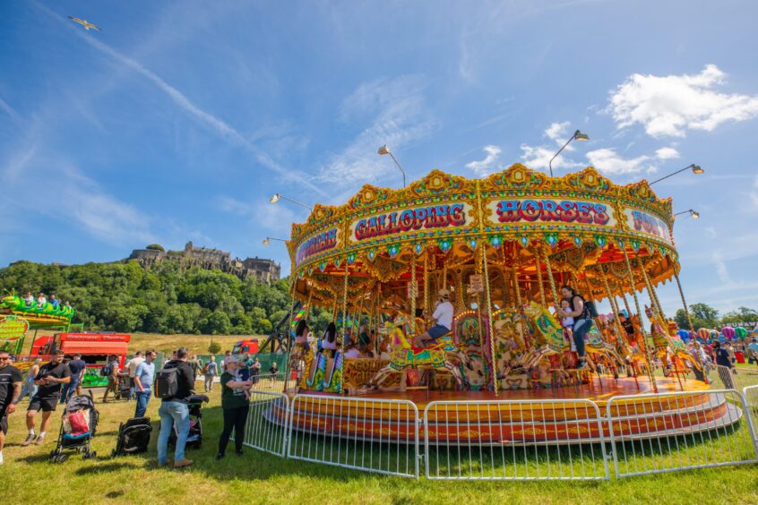 Families enjoy the fairground rides at the Big Summer Spectacular.