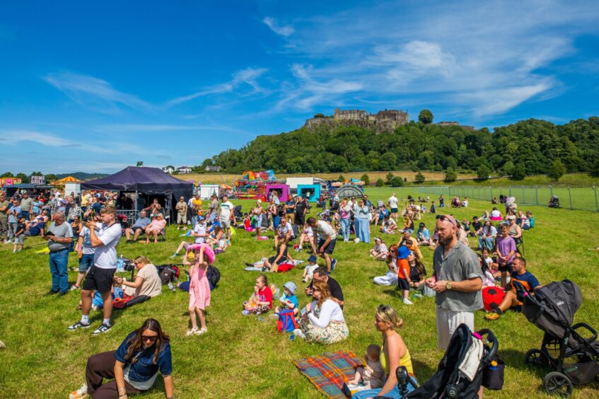 Crowds watch the music performances at the event.