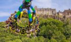 Visitors enjoy the fairground rides with Stirling Castle as a 'spectacular' backdrop.  Image: Steve MacDougall/DC Thomson