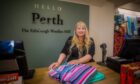 Store manager Lucy Wright in the new Edinburgh Woollen Mill. Image: Steve MacDougall/DC Thomson