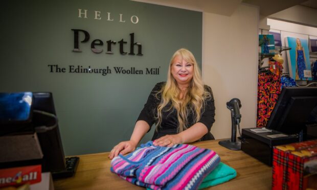 Store manager Lucy Wright in the new Edinburgh Woollen Mill. Image: Steve MacDougall/DC Thomson