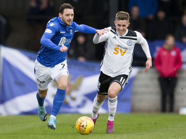 Wright takes on future Dundee star Luke McCowan in a Scottish Cup clash. Image: Bruce White/SNS
