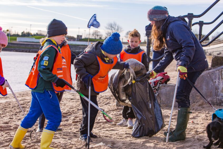 Youngsters collect rubbish on Burntisland beach.