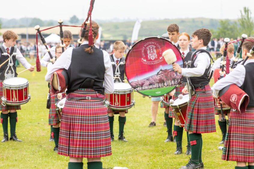 George Watson's College warms up before their performance.