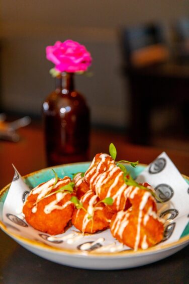 A plate of deep fried cauliflower.