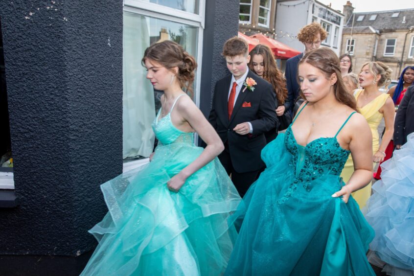 Revellers wearing fabulous dresses