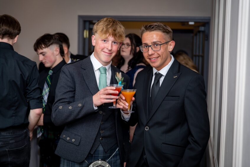 Revellers say "cheers" at the event