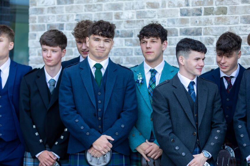 Boys wearing kilts