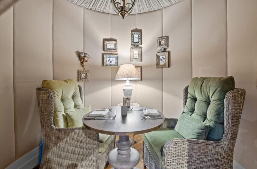 Chairs and a table inside the turret room