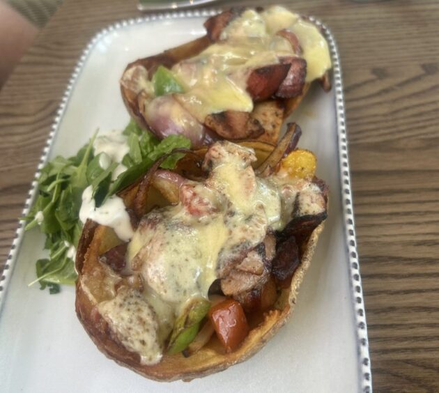 Two tattie skins filled with meat and cheese.
