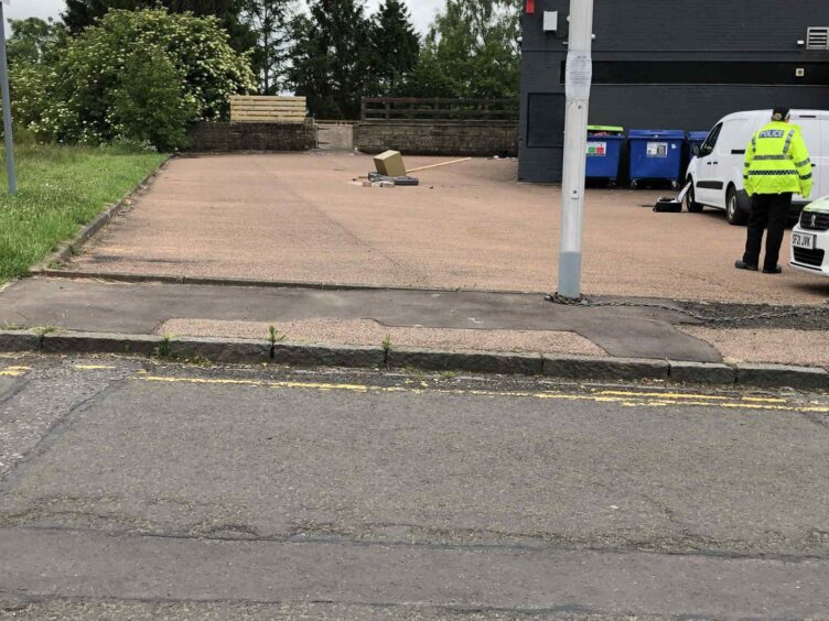 The suitcase and safe lying in the car park of The Bayview Bar in Dundee.