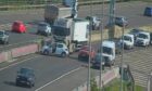 M90 crash between lorry and car.