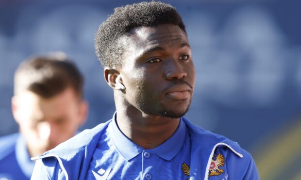 A close-up picture of Adama Sidibeh before a game.