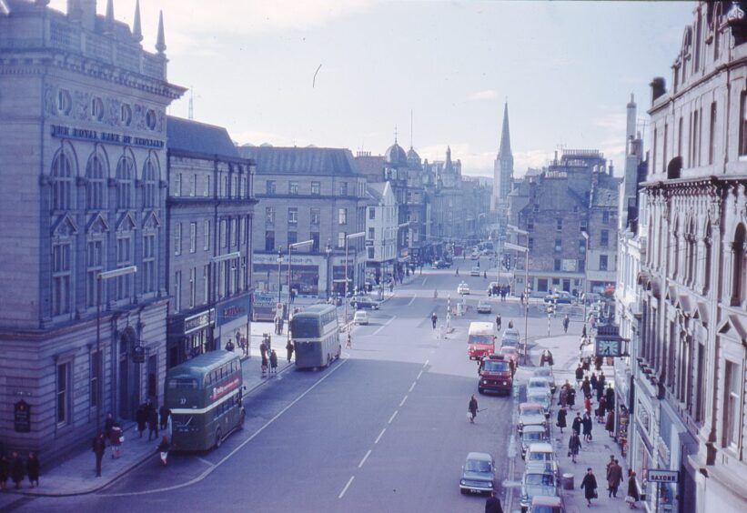 people and cars are visible in this elevated view along the High Street in Dundee