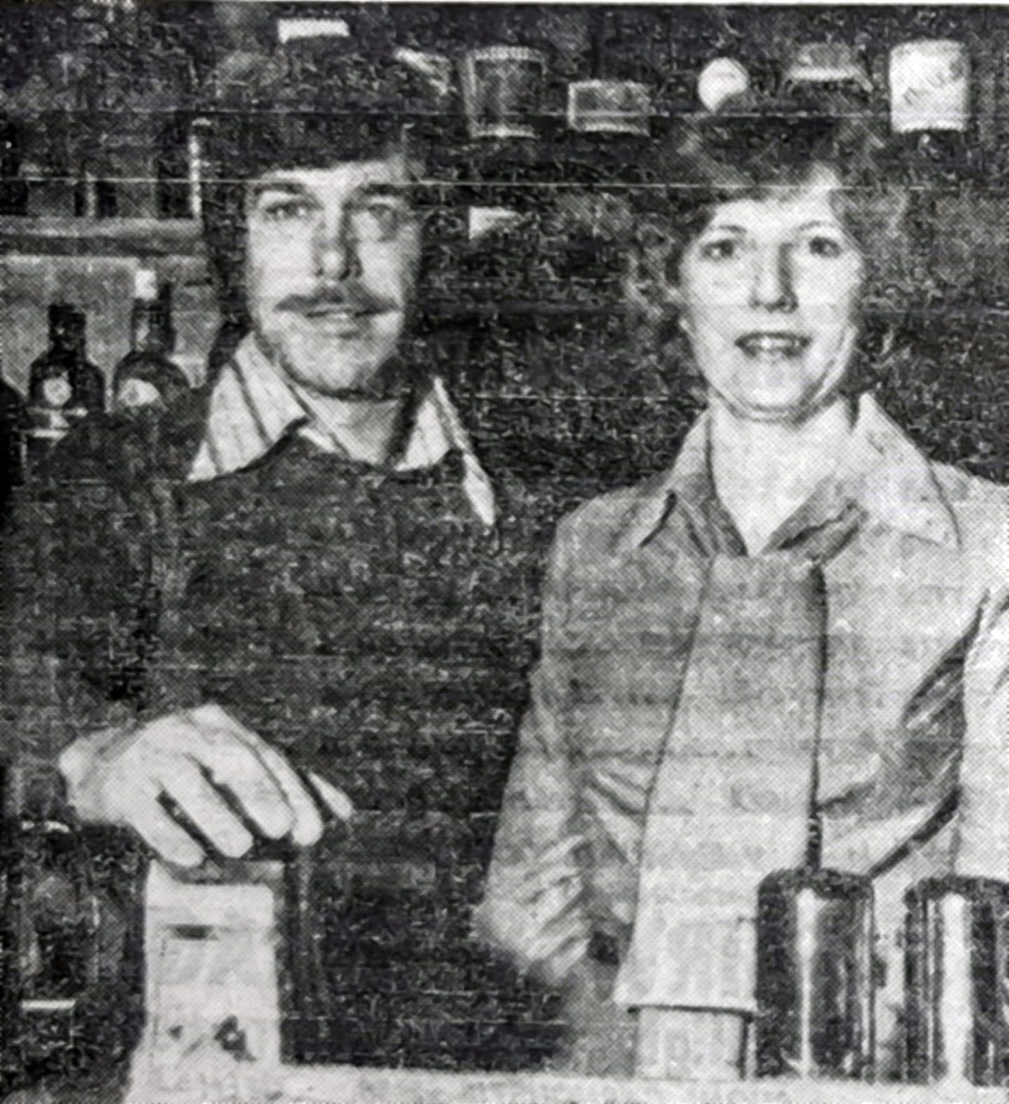 a black and white picture of Jimmy Watt and Margaret Crichton behind the bar in 1978.