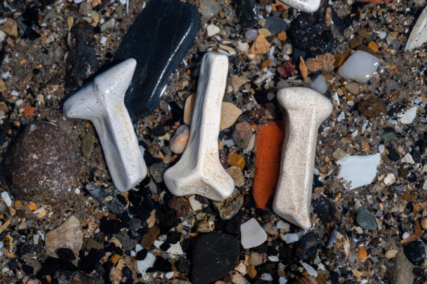 We see lots of kiln stilts which were used by potteries to separate pieces as they were fired.