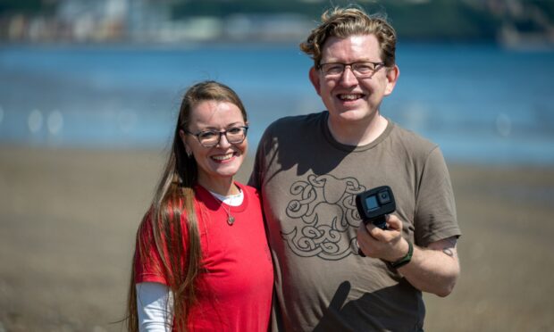 Scottish Mudlarkers Nicole and Craig Lind on the beach, Kirkcaldy.