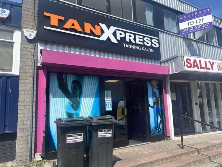 The exterior of a tanning salon in Dundee. 