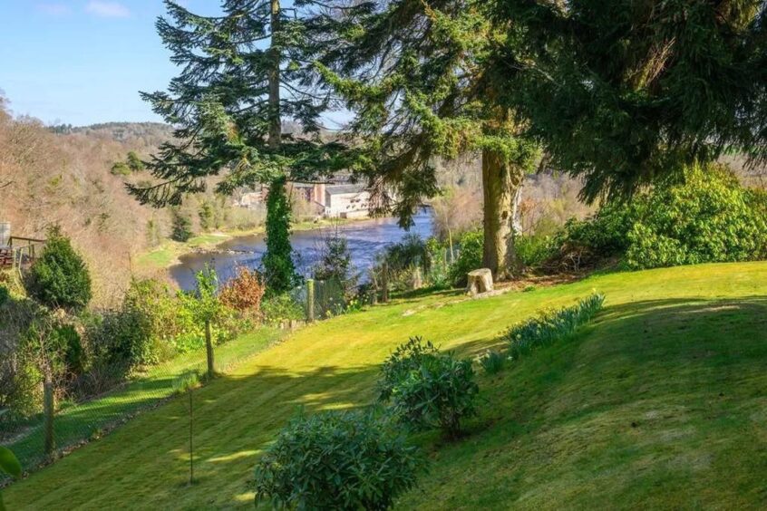 Gardens lead down to the river