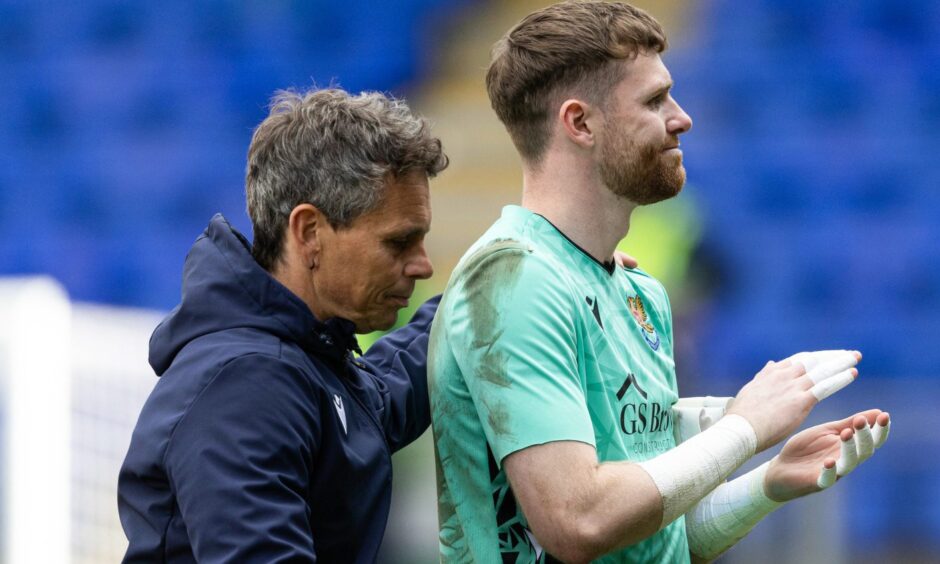 Simo Valakari pats Andy Fisher on the shoulder at the end of a St Johnstone game.