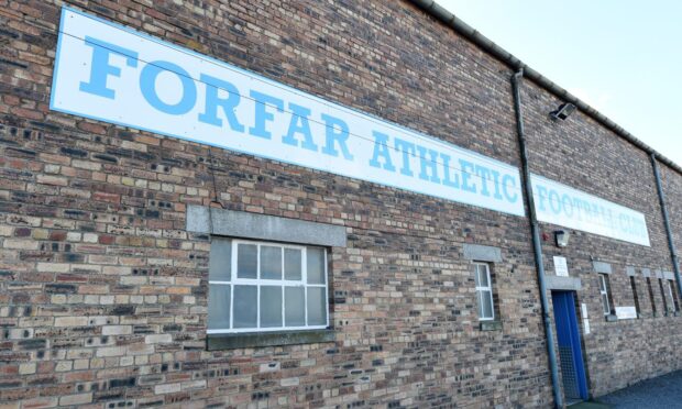 A Forfar Athletic sign on the outside of the main stand at Station Park.
