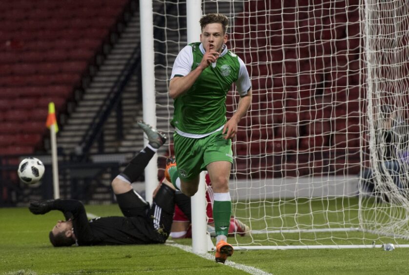 Jamie Gullan celebrates scoring for Hibs in a youth cup final.