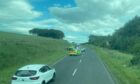 The scene after a two-car collision on the A92 near Inverkeilor.