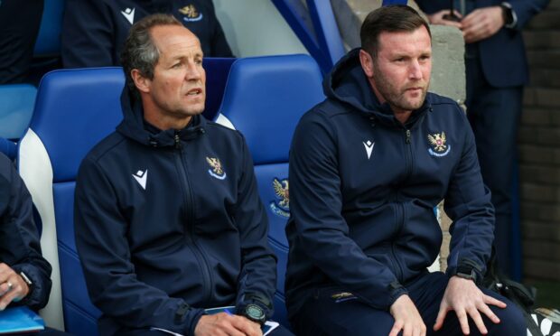 Andy Kirk and Alex Cleland in a dugout at McDiarmid Park.