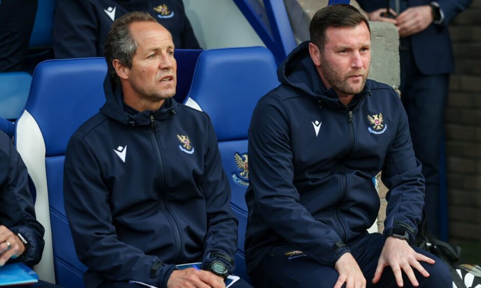 Andy Kirk and Alex Cleland in a dugout at McDiarmid Park.