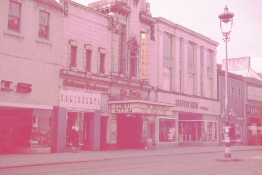 the outside of The La Scala in Murraygate. The marquee shows that The Sundowners and The Searchers are showing 