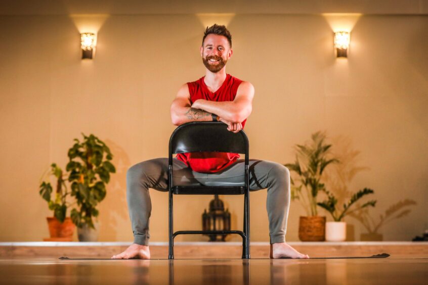 Kilted yoga star Finlay Wilson. I