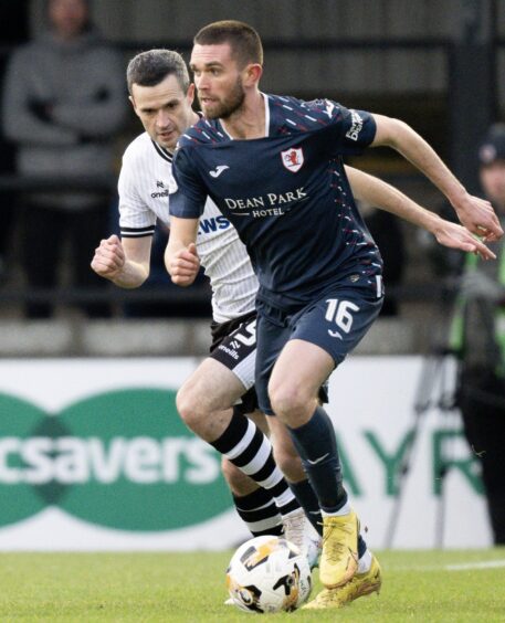 Sam Stanton takes the ball away from an Ayr United player while playing for Raith Rovers.