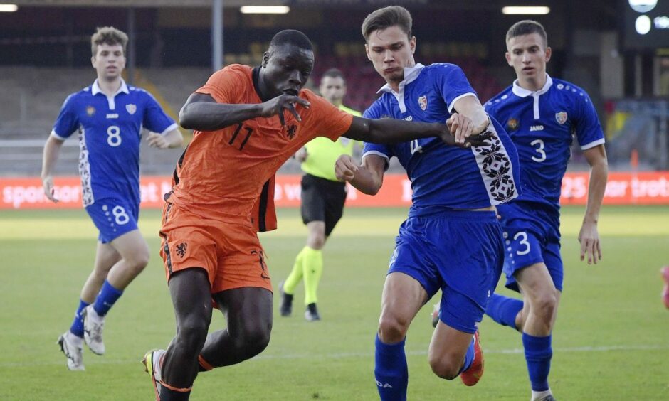 Iovu in action for Moldova's U/21 side against their Holland counterparts
