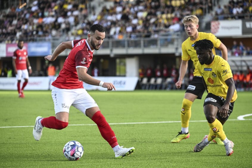 Amine Zenadji, left, in full flow.
