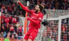 Said Hamulic celebrates finding the net during a recent loan at Widzew Lodz