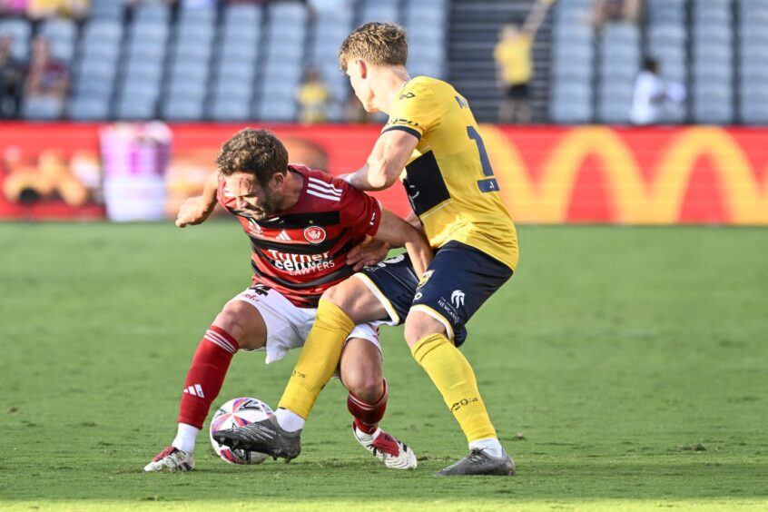 Juan Mata, left, in action for the Western Sydney Wanderers