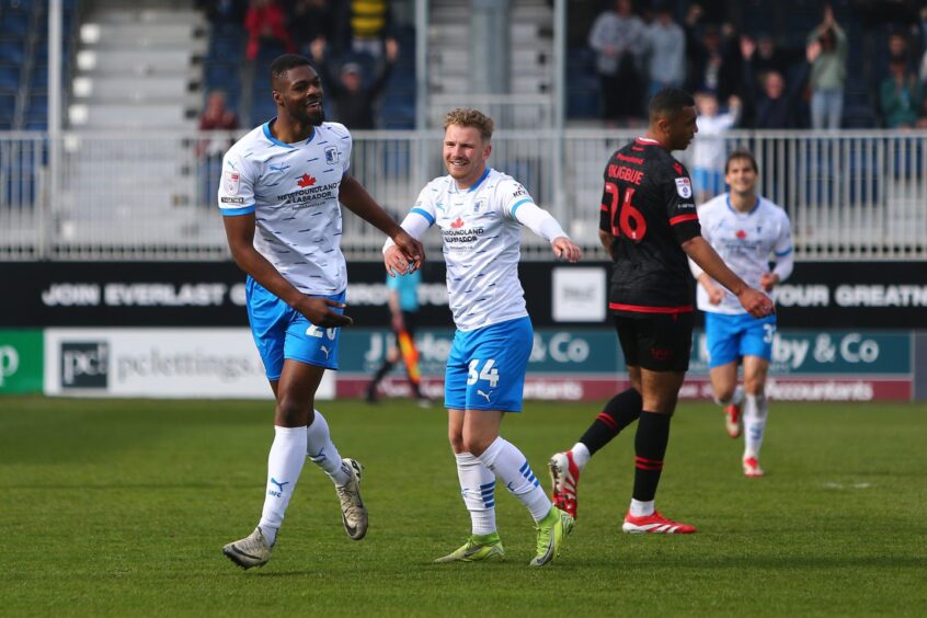 Emile Acquah celebrates